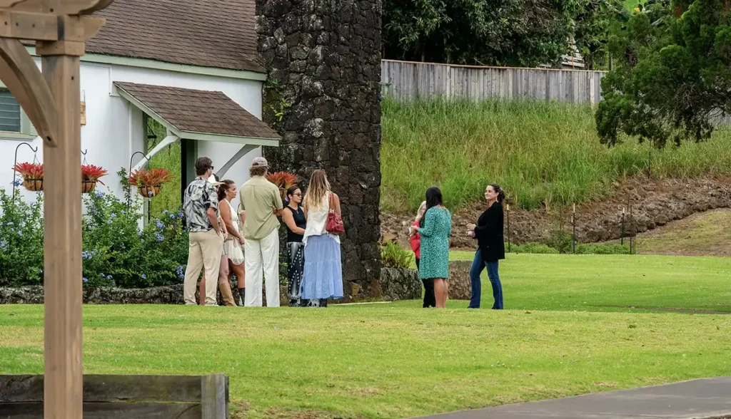 Guests on the historic walking tour on the estate lawn
