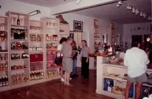 Historic photo of guests browsing the winery tasting room shop