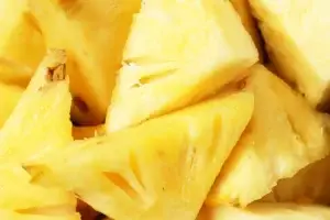 Close-up of fresh-cut pineapple chunks