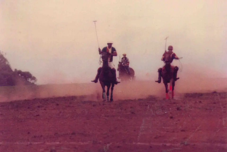 Sepia photo of polo players on horseback at Ulupalakua