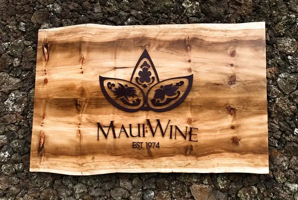 MauiWine logo branded into a wooden board